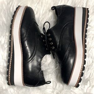 Brand new. Justfab Women’s, black, platform oxfords with original box. Size 10